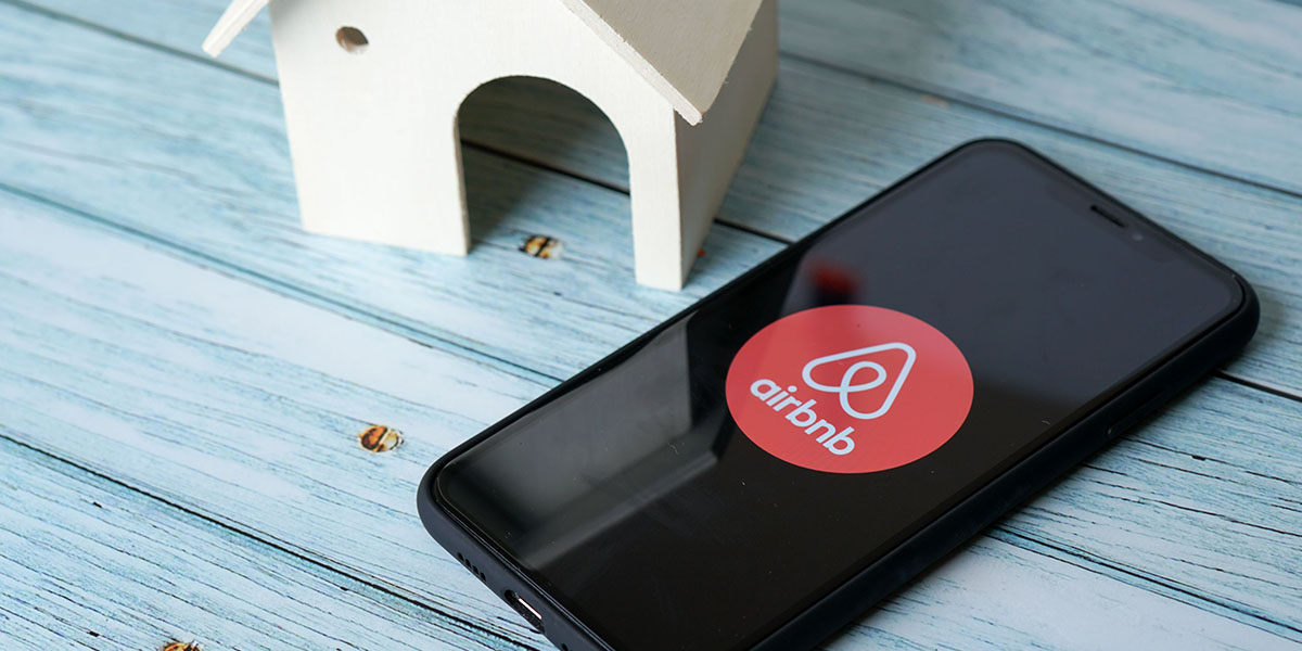 Airbnb application icon on smartphone