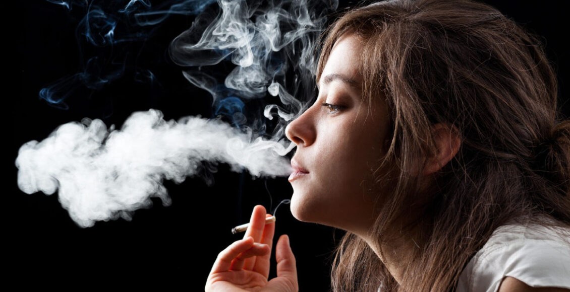 a woman smoking cigarette